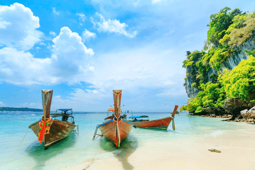 Phuket longtail boats at a tropical beach for a Thailand first trip
